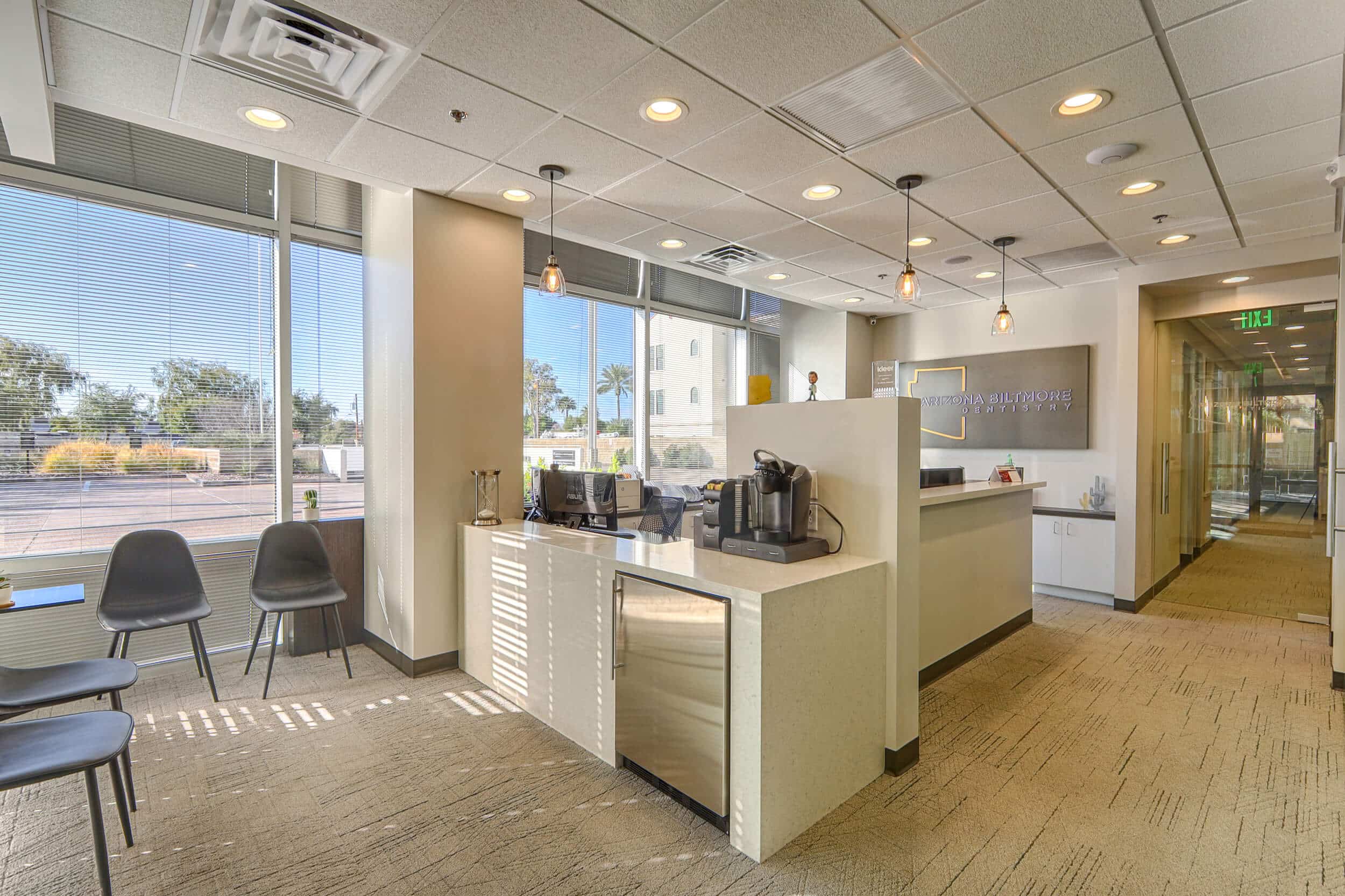 Front desk and waiting area of the Phoenix office